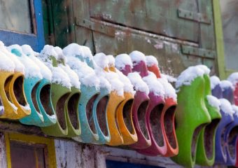 Header image of Clogs in Amsterdam covered in snow